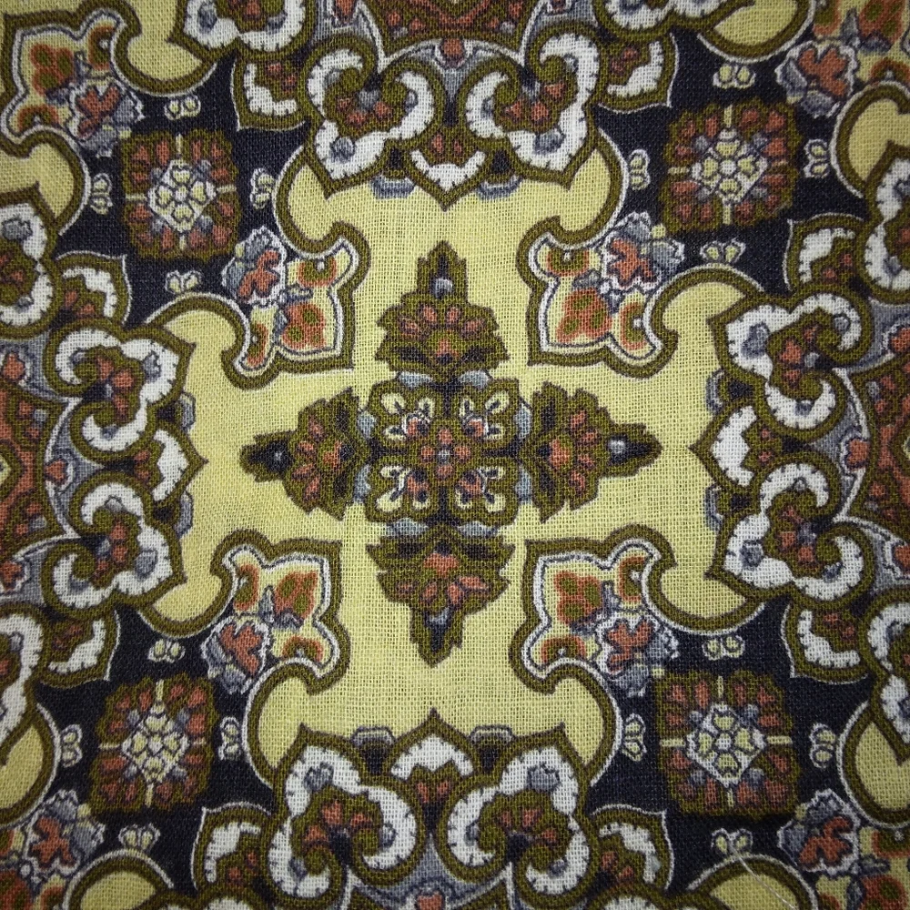 FABRIC Vintage Brown on gold regularly set stylized medallions 1 yd +